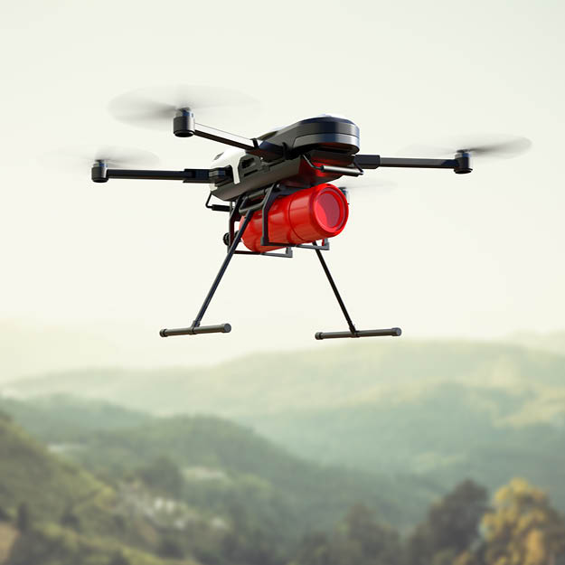 drone carrying fire extinguisher cannister