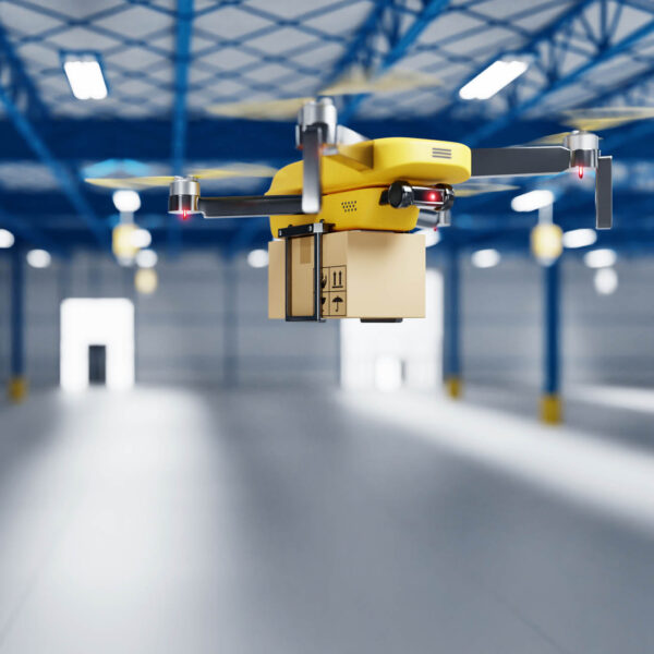 drone in warehouse carrying package