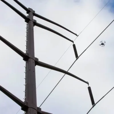 drone flying near electrical wires