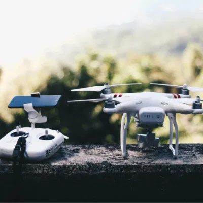 a drone next to a remote control