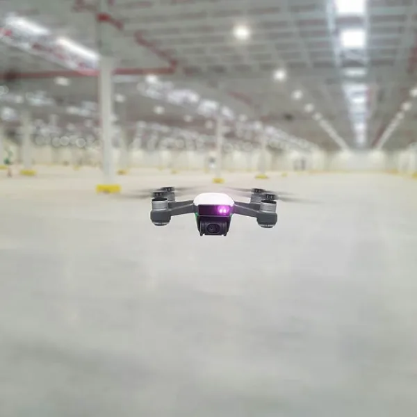 0617-drone-manufacture drone flying in a manufacturing plant