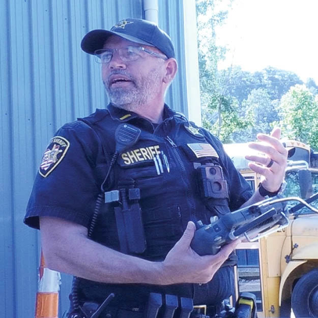 Lt. John Morris explaining the dynamics of the drone his department uses. [Abigail Semple | WOUB]