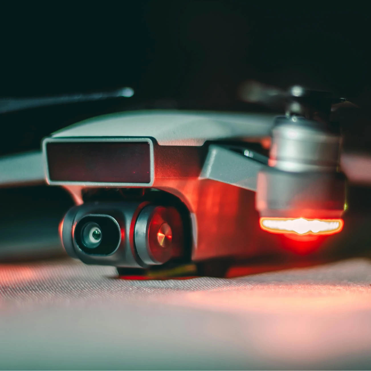 close up of drone with red glowing light